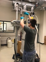 Jason placing his NMR tube on the NMR autosampler